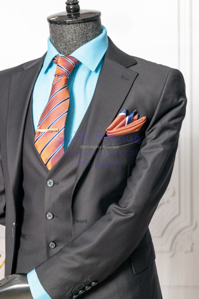 Close-up of the fine wool blend fabric detailing of the suit.