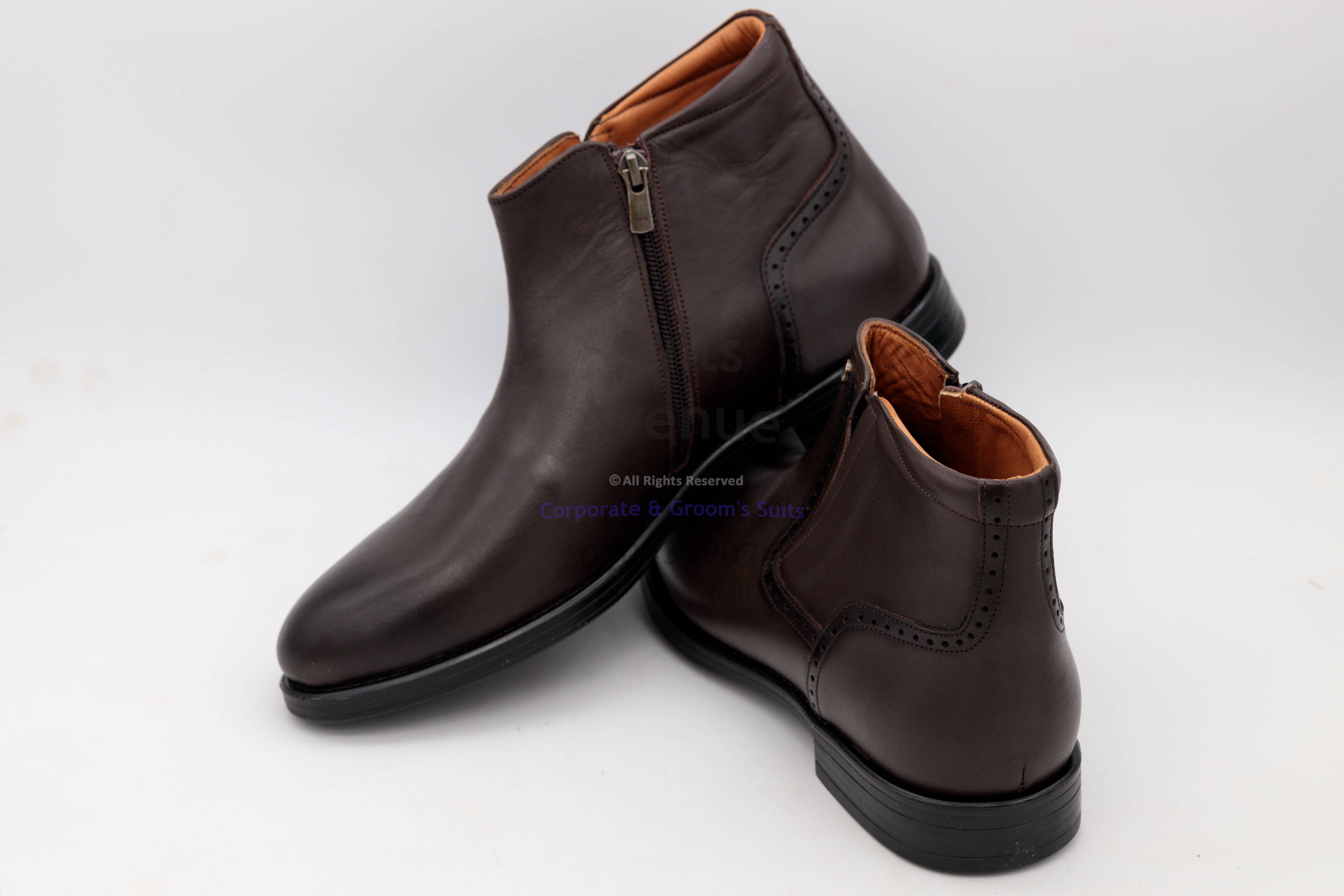 Stylish wingtip leather office shoes with intricate brogue detailing, crafted from 100% leather, suitable for business and smart-casual outfits.