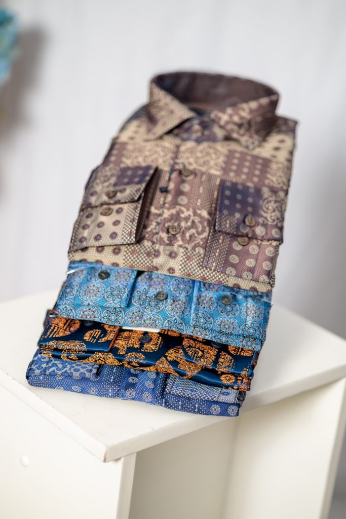 A crisp, well-structured Presidential Shirt styled with classic trousers, embodying confidence, professionalism, and luxury.