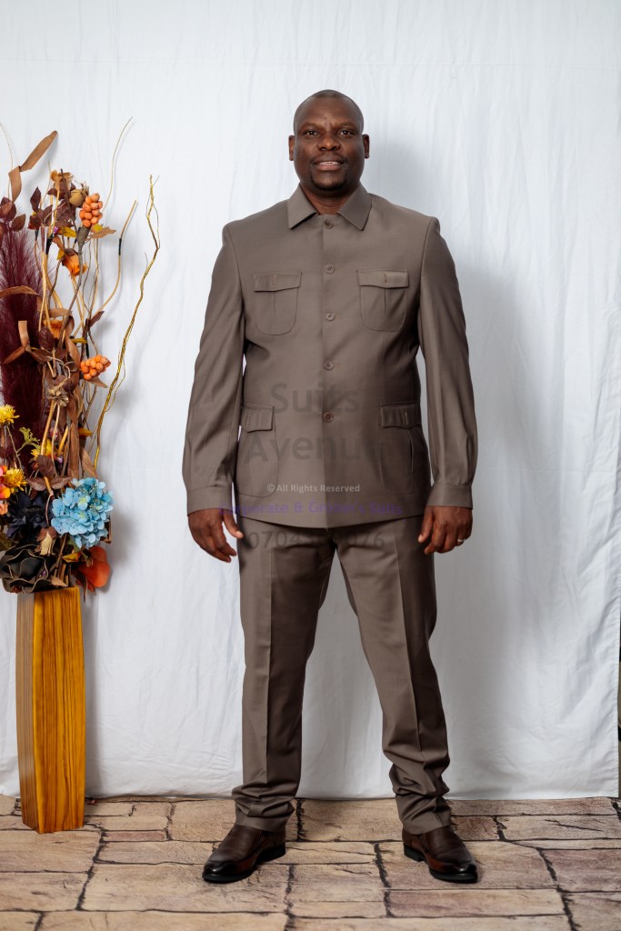 For the driven man. Own the room with our executive grey wool Kaunda suit.