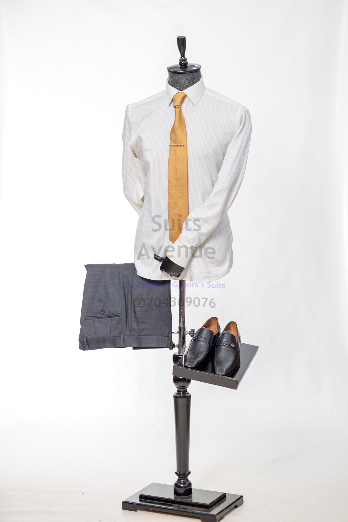 Where Can Ambitious Men in Kampala Find the Perfect Office Shirts?