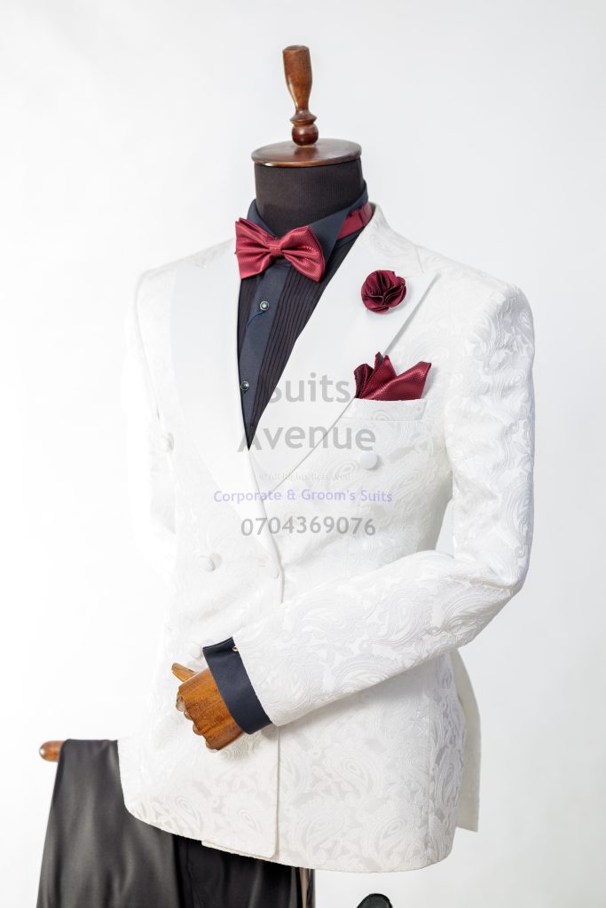 This guide explains the main differences between a tuxedo and a suit and which is right for a wedding suit. It covers formality, key styling details, and practical advice so you can choose the best outfit for a clear, confident look in Kampala. — Part 3 What Is a Tuxedo vs a Suit: Wedding Suit Guide in Kampala — Part 3