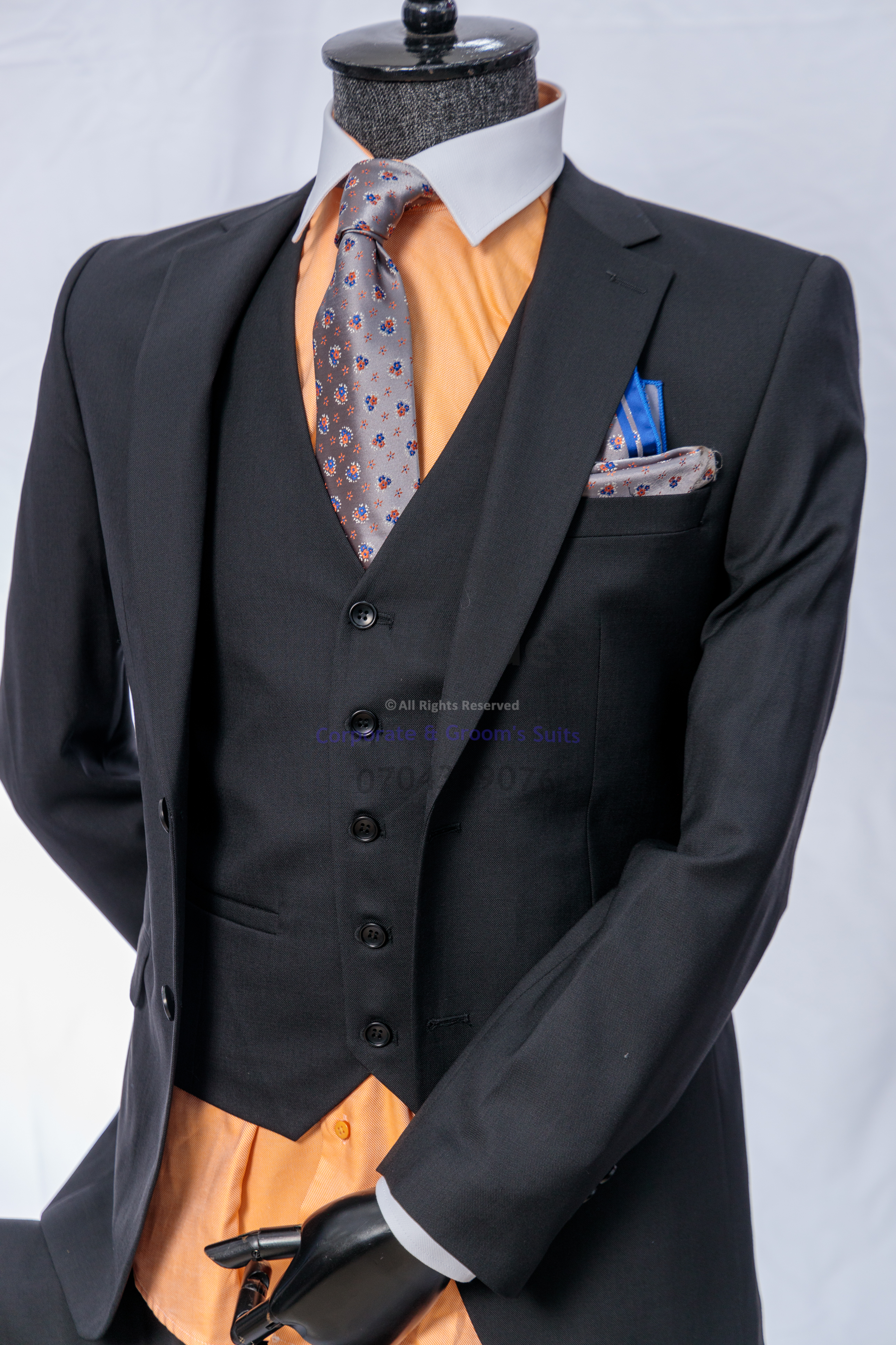 ## Quick Checklist: Choosing the Right Wool Suit for the Dress Code
Use this fast checklist before you dress:
- **Read the invitation:** Does it say casual, smart casual, business/business formal, or black tie?
- **Pick the right base color:**
  - Smart casual/business: navy, charcoal, grey
  - Black tie: traditional dark formal tones
- **Check fit first:** shoulders aligned, jacket closes cleanly, trousers sit well at the waist
- **Match formality with details:** tie or no tie, shoe choice, and accessories should fit the level
- **Avoid extremes:** too tight, too loose, too shiny, or too loud for the setting

If you attend a black-tie wedding or evening function, use a guide that focuses on the correct formal details so you do not guess.

Link to this article to help readers choose the correct wool suit details for black-tie events, especially weddings and evening functions. https://suitsavenue.blog/black-tie-wedding-suit-men-kampala-style-guide/

Click the WhatsApp button to speak with Suits Avenue and get help choosing the right piece. — Part 3