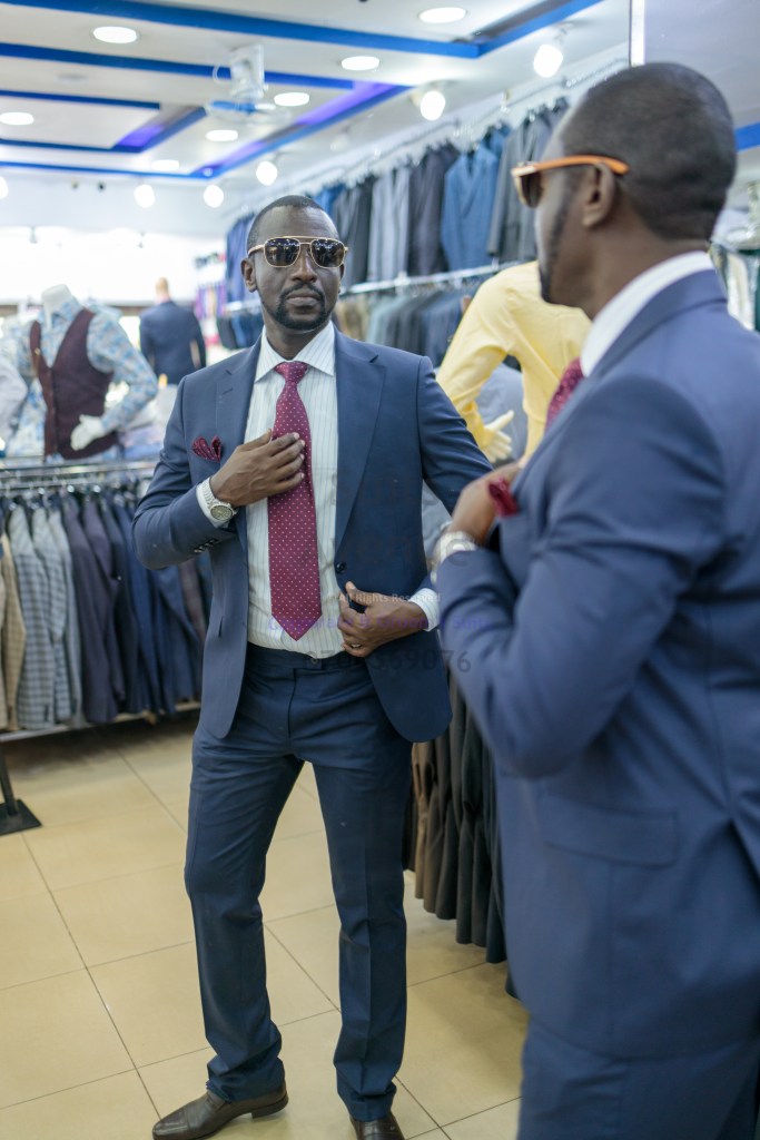 Man wearing a refined wool suit for a professional wardrobe in Kampala